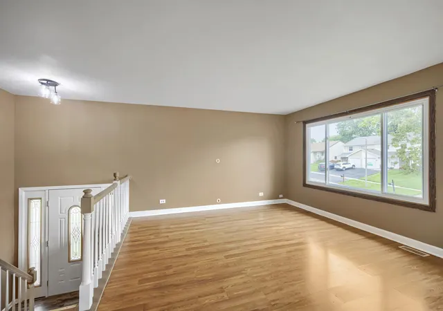 Photo 3 of Multi family home for sale at 2165 Wildwood Ct, Hanover Park, IL 60133 | MLS# 12738422 | Listing updated on 2026-08-28