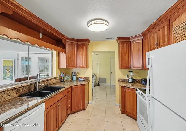 Photo 3 of Single family home for sale at 575 Glenwood Ave, Satellite Beach, FL 32937 | MLS# 1084810 | Listing updated on 2026-08-21