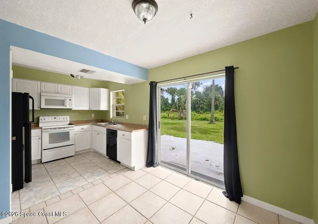 Photo 4 of Single family home for sale at 915 Burn Dr NE, Palm Bay, FL 32905 | MLS# 1084551 | Listing updated on 2026-09-10