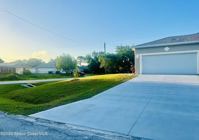Photo 3 of Single family home for sale at 401 Homestead Ave Ne, Palm Bay, FL 32907 | MLS# 1081106 | Listing updated on 2026-09-02