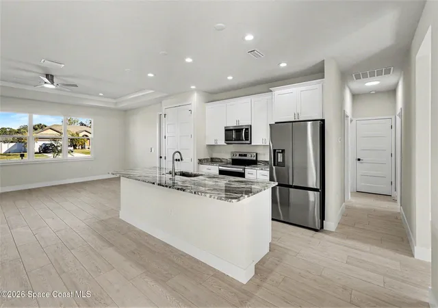 Photo 2 of Single family home for sale at 1121 Pluto St Se, Palm Bay, FL 32909 | MLS# 1084623 | Listing updated on 2026-08-11