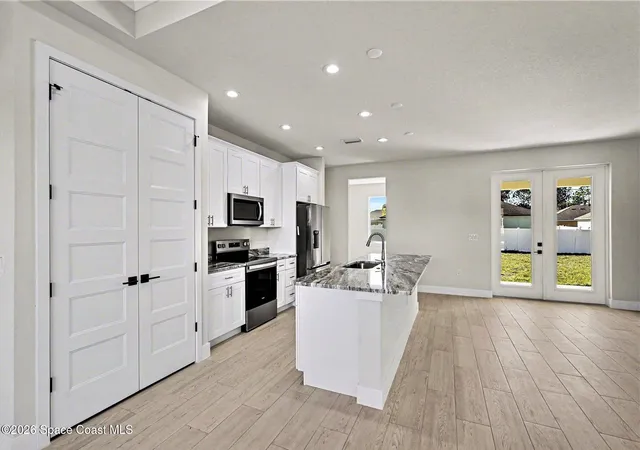Photo 3 of Single family home for sale at 1121 Pluto St Se, Palm Bay, FL 32909 | MLS# 1084623 | Listing updated on 2026-08-11