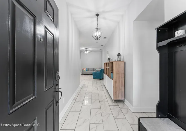 Photo 3 of Single family home for sale at 301 Wishing Well Cir Sw, Palm Bay, FL 32908 | MLS# 1082609 | Listing updated on 2026-07-16