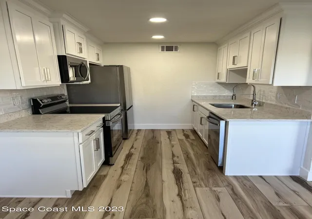 Listing Photo 4 - Condo for sale in building located at 4311 Tree Ridge Ln NE, Palm Bay, FL 32905