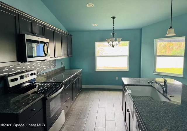 Photo 2 of Single family home for sale at 419 Gantry St Sw, Palm Bay, FL 32908 | MLS# 1082979 | Listing updated on 2026-09-02