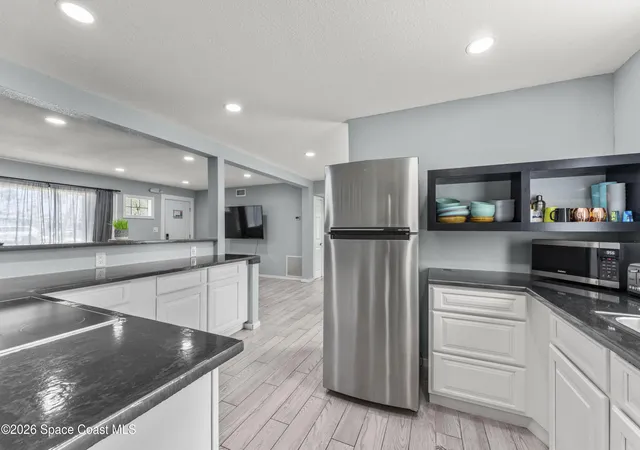 Photo 3 of Single family home for sale at 450 S Brevard Ave, Cocoa Beach, FL 32931 | MLS# 1083145 | Listing updated on 2026-09-14