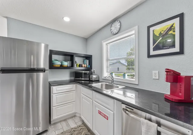 Photo 4 of Single family home for sale at 450 S Brevard Ave, Cocoa Beach, FL 32931 | MLS# 1083145 | Listing updated on 2026-09-14