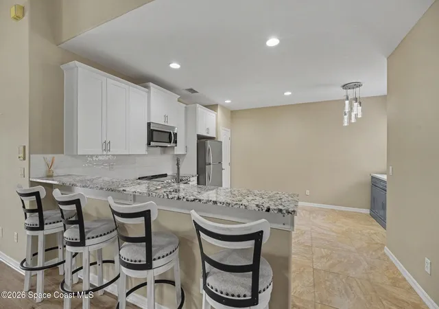 Photo 3 of Townhouse for sale at 1030 Venetian Dr #203, Melbourne, FL 32904 | MLS# 1083208 | Listing updated on 2026-09-17
