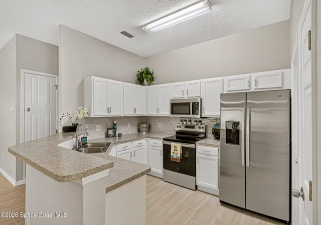 Photo 3 of Single family home for sale at 1541 Morgan Ct, Melbourne, FL 32934 | MLS# 1085307 | Listing updated on 2026-09-17
