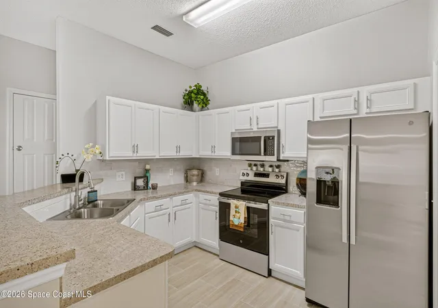 Photo 3 of Single family home for sale at 1541 Morgan Ct, Melbourne, FL 32934 | MLS# 1085307 | Listing updated on 2026-09-17