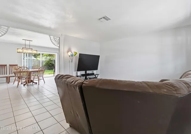 Photo 2 of Single family home for sale at 585 S Sunrise Dr, Titusville, FL 32780 | MLS# 1083373 | Listing updated on 2026-09-07