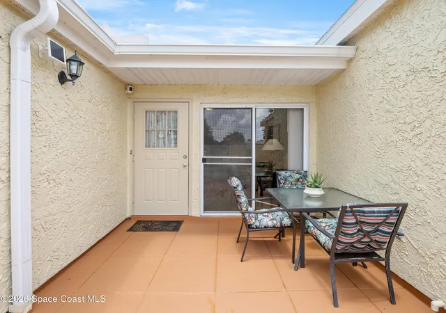 Photo 3 of Townhouse for sale at 1445 Malibu Cir NE #107, Palm Bay, FL 32905 | MLS# 1083460 | Listing updated on 2026-08-14