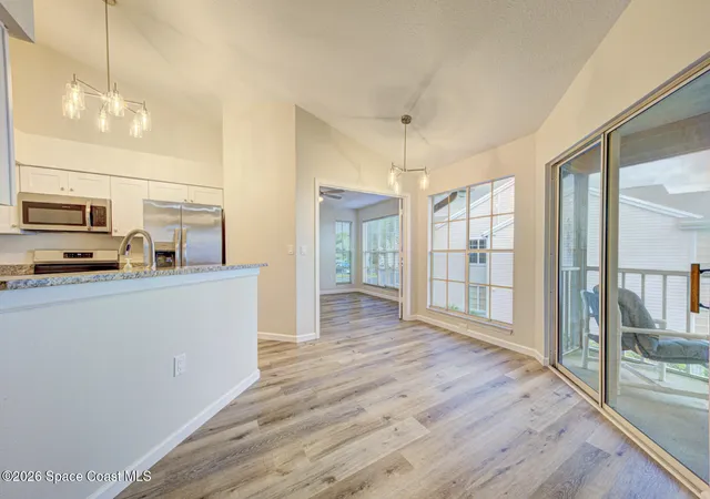 Listing Photo 5 - Condo for sale in building located at 7060 N Hwy 1, Cocoa, FL 32927 - Unit #Aa-201