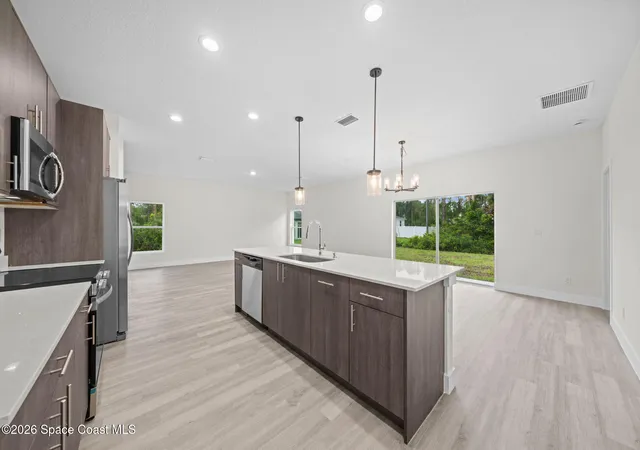 Photo 3 of Sale Pending at 1240 Cogan Dr SE, Palm Bay, FL 32909 | MLS# 1083949 | Listing updated on 2026-08-21