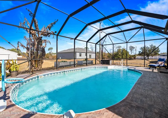 Photo 2 of Single family home for sale at 1401 Palau St Se, Palm Bay, FL 32909 | MLS# 1083772 | Listing updated on 2026-08-16