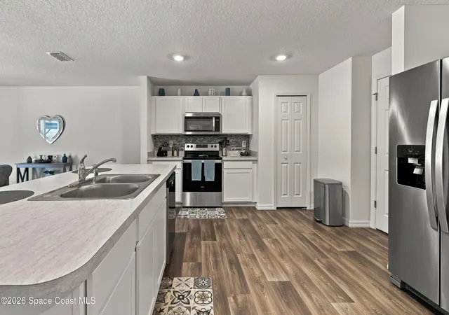 Photo 3 of Single family home for sale at 102 Fayetteville St SW, Palm Bay, FL 32908 | MLS# 1084310 | Listing updated on 2026-09-10