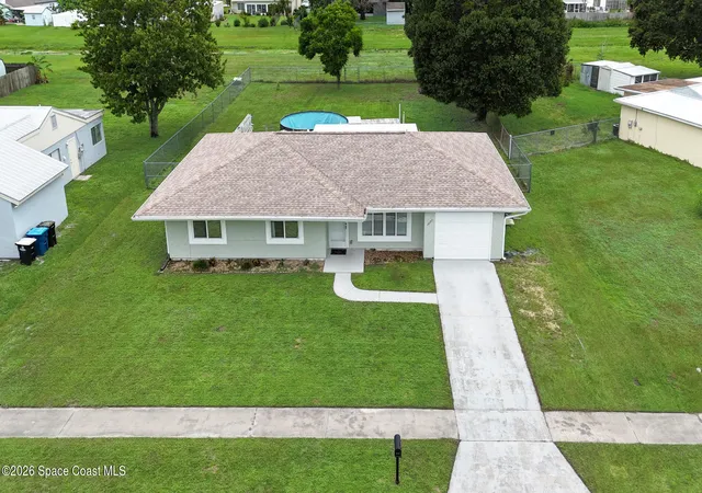 Photo 3 of Single family home for sale at 1022 Hooper Ave Ne, Palm Bay, FL 32905 | MLS# 1084494 | Listing updated on 2026-09-19