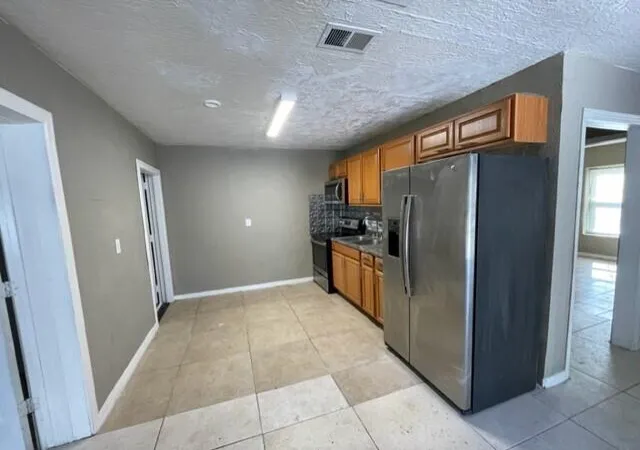 4th image of 415 S Robbins Ave, Titusville, FL 32796