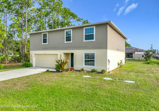 Photo 2 of Single family home for sale at 215 Friendly St, Palm Bay, FL 32908 | MLS# 1085002 | Listing updated on 2026-09-14