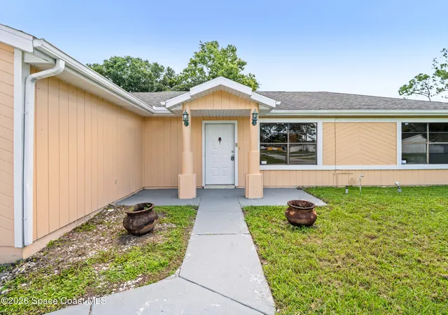 Photo 2 of Single family home for sale at 971 Gannet Ave Nw, Palm Bay, FL 32907 | MLS# 1084888 | Listing updated on 2026-10-09