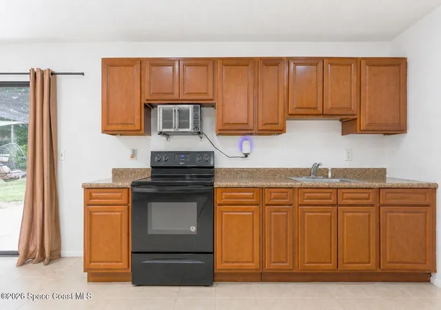 Photo 4 of Single family home for sale at 970 Culpepper Ave SE, Palm Bay, FL 32909 | MLS# 1085017 | Listing updated on 2026-08-15