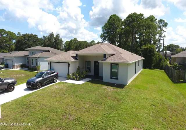 Photo 2 of Single family home for sale at 1548 Rainsville Rd Se, Palm Bay, FL 32909 | MLS# 1084990 | Listing updated on 2026-09-09