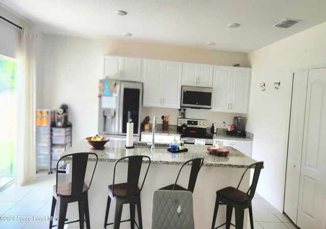Photo 3 of Single family home for sale at 1051 Pope St Nw, Palm Bay, FL 32907 | MLS# 1085103 | Listing updated on 2026-09-19