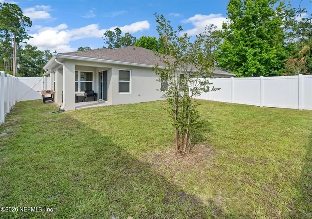 Listing Photo 2 - Condo for sale in building located at 24 Pontiac Ln, Palm Coast, FL 32164 - Unit #