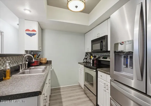 Photo 3 of Townhouse for sale at 1248 Wonderwood Dr, Jacksonville, FL 32233 | MLS# 2156104 | Listing updated on 2026-09-12