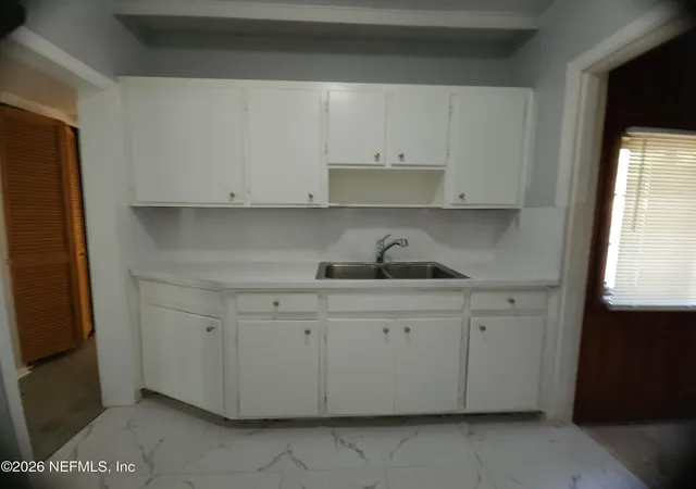 Photo 4 of Single family home for sale at 8004 Delaware Ave, Jacksonville, FL 32208 | MLS# 2159896 | Listing updated on 2026-09-15