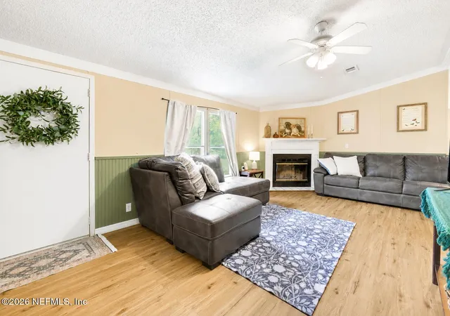 Photo 3 of Manufactured home for sale at 54196 Fouracre Cir, Callahan, FL 32011 | MLS# 2156398 | Listing updated on 2026-09-15