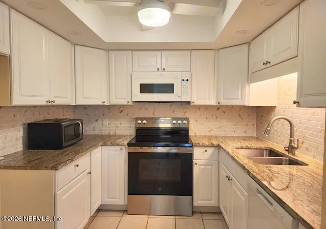 Photo 1 of Condo for sale at 1004 Defender Ct W #1004, Jacksonville, FL 32233 | MLS# 2156701 | Listing updated on 2026-10-03