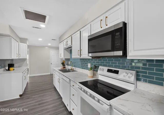 Photo 3 of Single family home for sale at 5028 NW 30th Terrace, Gainesville, FL 32605 | MLS# 2157079 | Listing updated on 2026-09-19