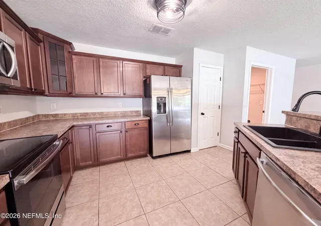 Photo 2 of Single family home for sale at 7428 Sweet Rose Ln, Jacksonville, FL 32244 | MLS# 2157117 | Listing updated on 2026-09-10