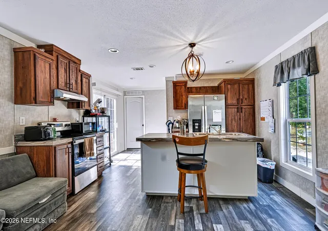 Photo 3 of Manufactured home for sale at 117 Gas Easement Rd, Interlachen, FL 32148 | MLS# 2157718 | Listing updated on 2026-10-12