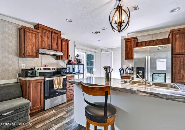 Photo 1 of Manufactured home for sale at 117 Gas Easement Rd, Interlachen, FL 32148 | MLS# 2157718 | Listing updated on 2026-10-12