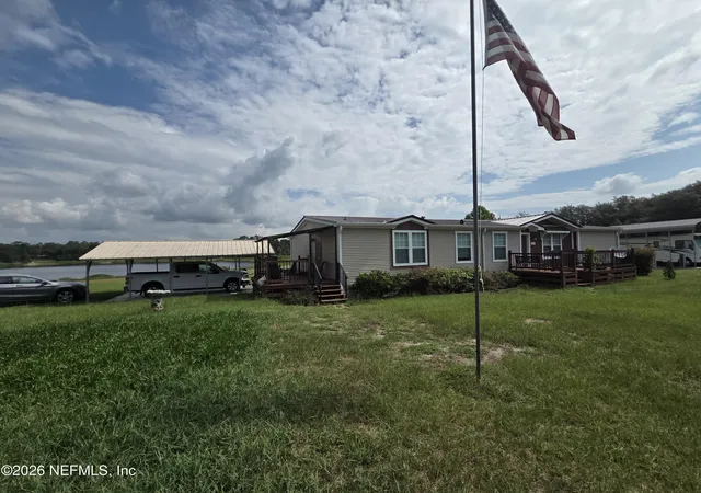 Photo 3 of Manufactured home for sale at 124 Junior Lake Trl, Interlachen, FL 32148 | MLS# 2158284 | Listing updated on 2026-09-21