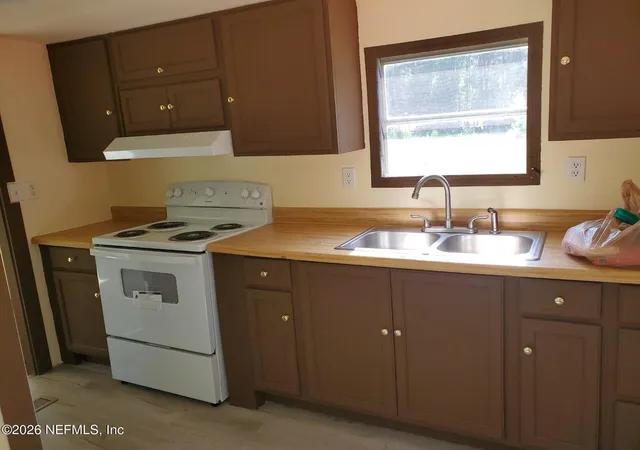 5th image of 1151 Village Green Dr, Jacksonville, FL 32234 | MLS# 2158407