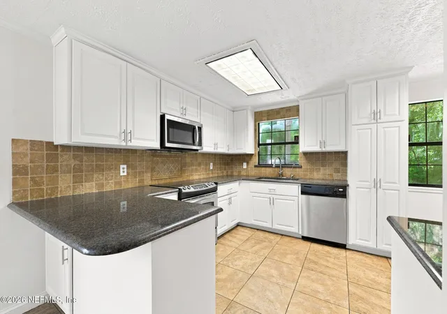 Photo 4 of Single family home for sale at 1504 Hammondwood Rd N, Jacksonville, FL 32221 | MLS# 2159089 | Listing updated on 2026-09-16