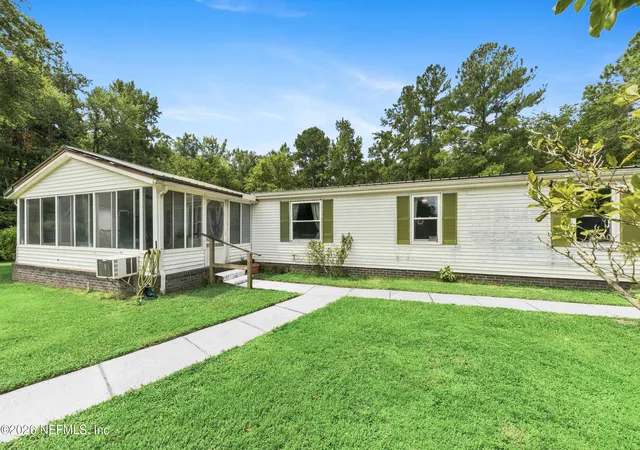 Photo 2 of Manufactured home for sale at 19801 Nolan Jones Rd, Hilliard, FL 32046 | MLS# 2159328 | Listing updated on 2026-08-14