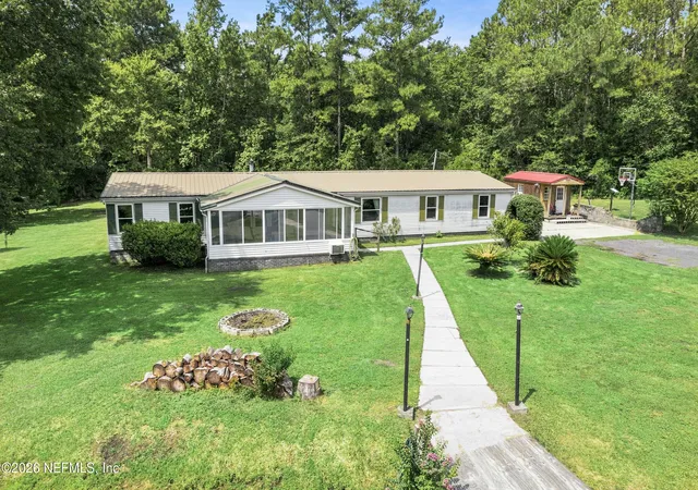 Photo 3 of Manufactured home for sale at 19801 Nolan Jones Rd, Hilliard, FL 32046 | MLS# 2159328 | Listing updated on 2026-08-14