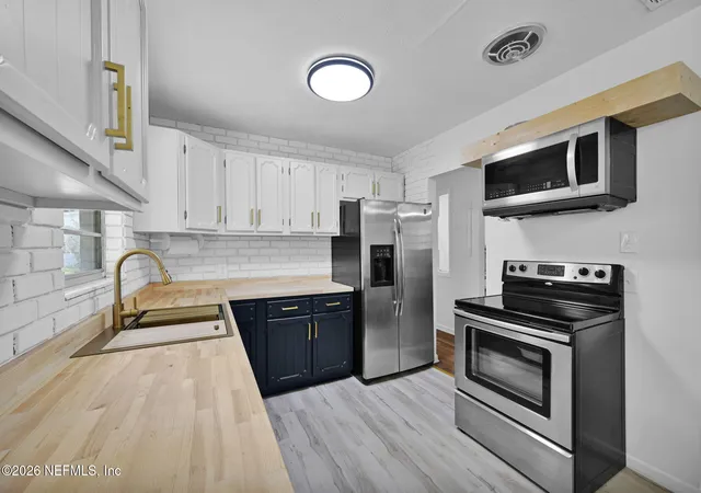 Photo 3 of Single family home for sale at 9038 Commonwealth Ave, Jacksonville, FL 32220 | MLS# 2159666 | Listing updated on 2026-09-17