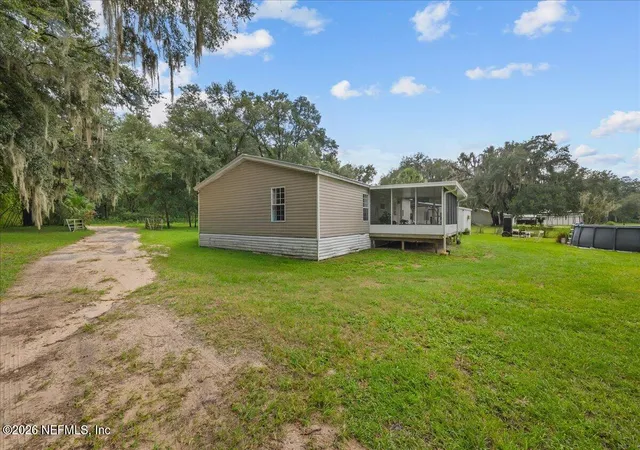 Photo 2 of Manufactured home for sale at 703 Walker Dr, Interlachen, FL 32148 | MLS# 2159598 | Listing updated on 2026-08-12