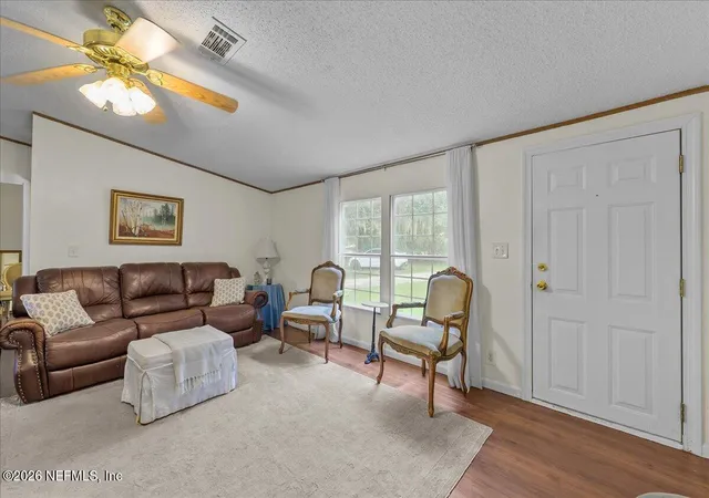 Photo 3 of Manufactured home for sale at 703 Walker Dr, Interlachen, FL 32148 | MLS# 2159598 | Listing updated on 2026-08-12
