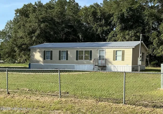 Photo 2 of Manufactured home for sale at 130 Yancey Cir, Satsuma, FL 32189 | MLS# 2160396 | Listing updated on 2026-09-01