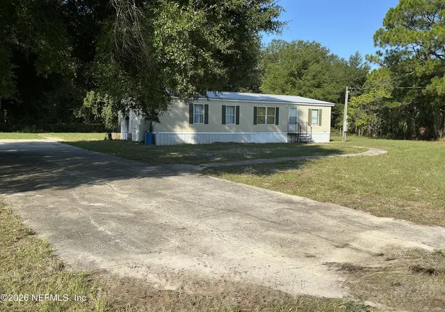 Photo 3 of Manufactured home for sale at 130 Yancey Cir, Satsuma, FL 32189 | MLS# 2160396 | Listing updated on 2026-09-28