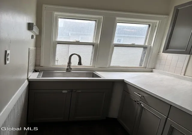 Listing Photo 2 - Condo for sale in building located at 110 Broad St, Gloversville, NY 12078 - Unit #