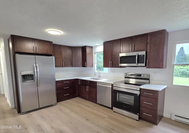 2nd image of 12 New Britain Dr, Gansevoort, NY 12831 | MLS# 202623237