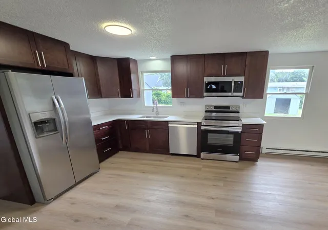 3rd image of 12 New Britain Dr, Gansevoort, NY 12831 | MLS# 202623237