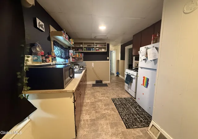 Listing Photo 2 - Condo for sale in building located at 242 Bleecker St, Gloversville, NY 12078 - Unit #